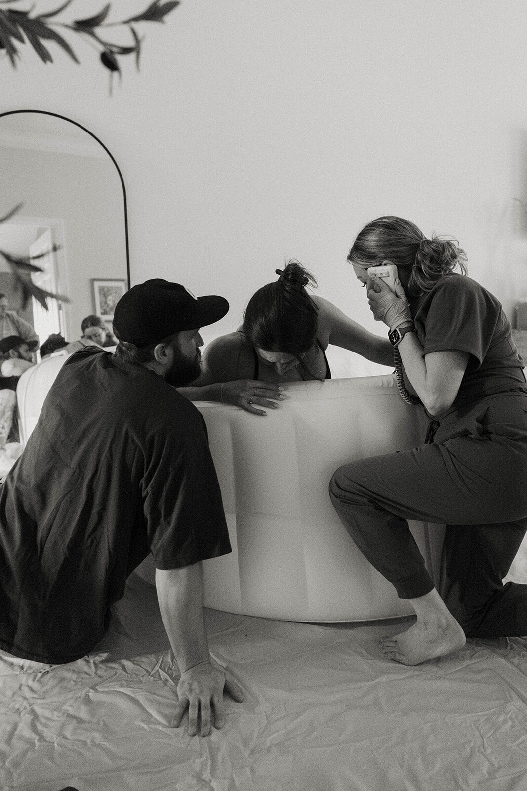Rhonda and a partner supporting a laboring mother