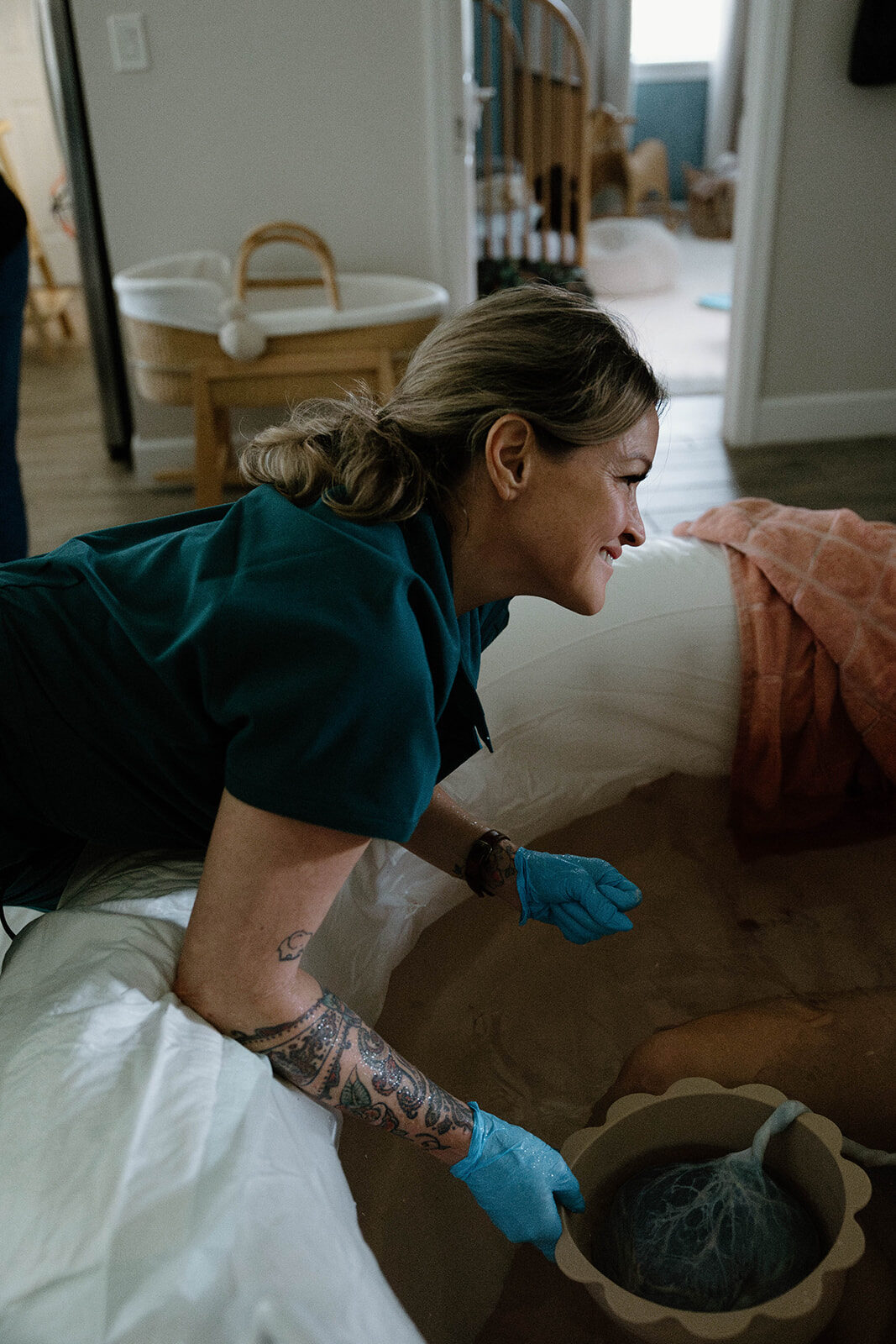 Rhonda caring for a family just after birth